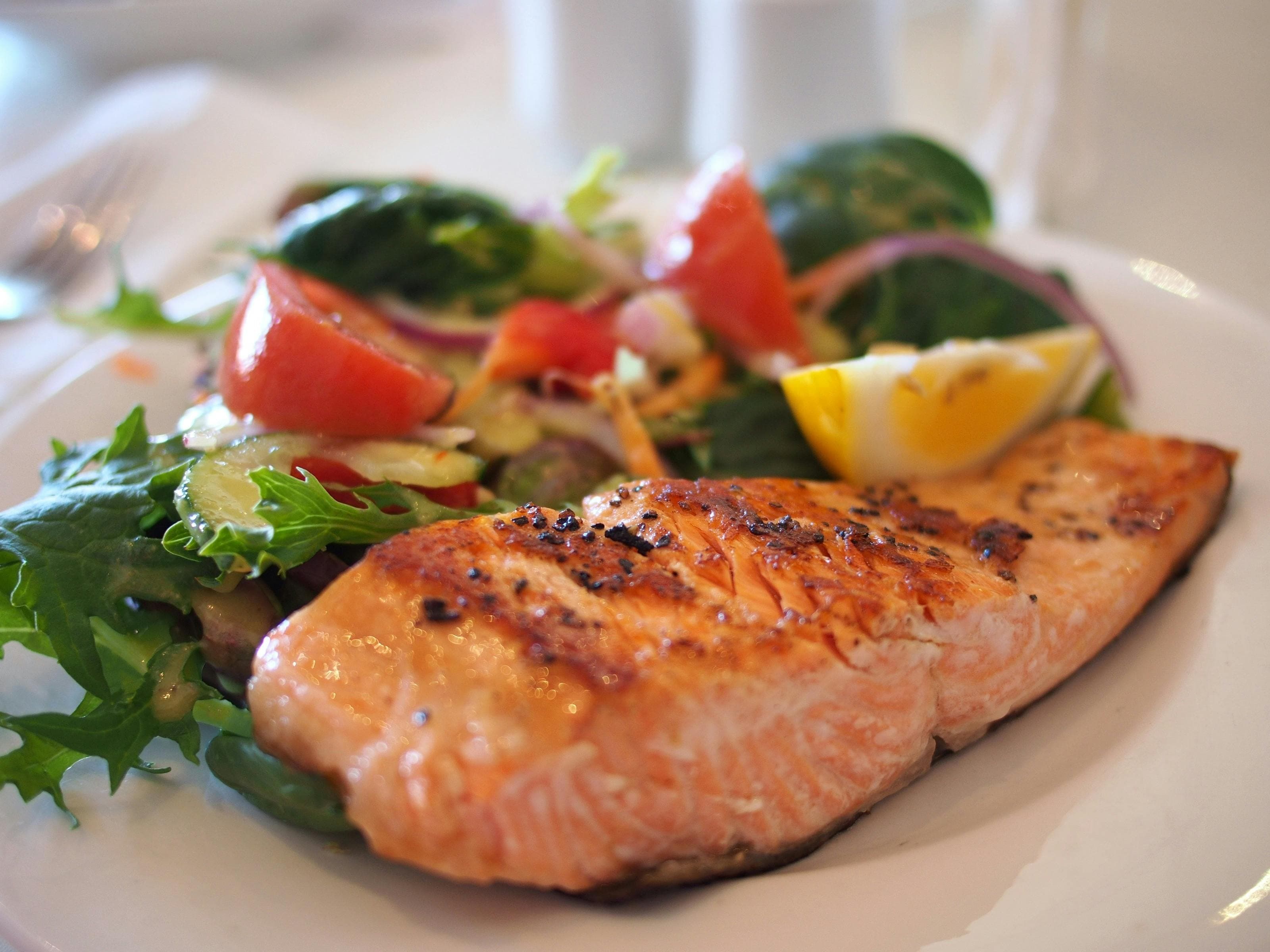 Cooked salmon meal with vegetables.